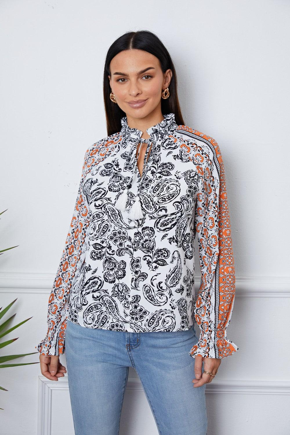 Tassel Tie Neck Printed Smocked Long Sleeve Blouse - Immenzive