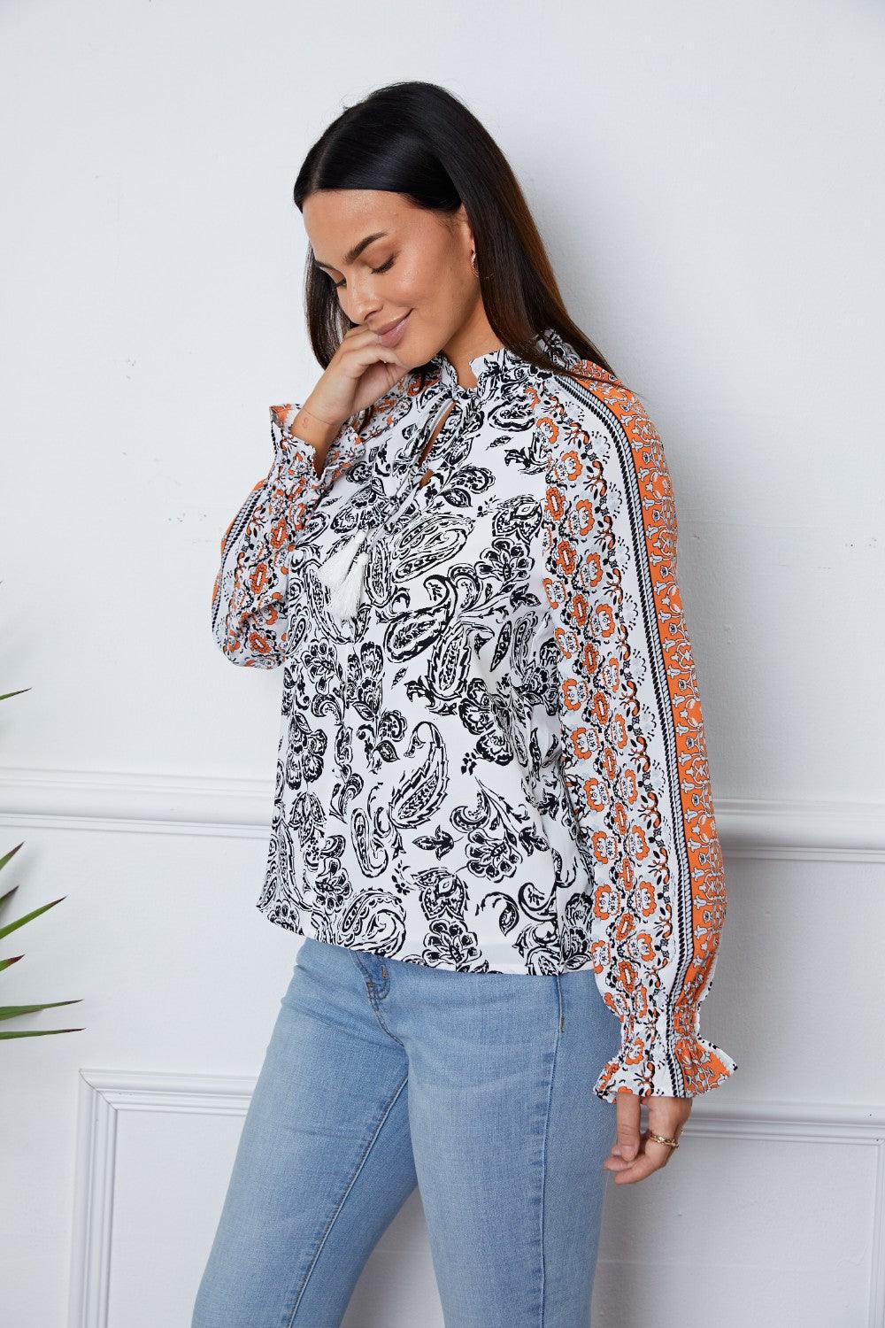 Tassel Tie Neck Printed Smocked Long Sleeve Blouse - Immenzive